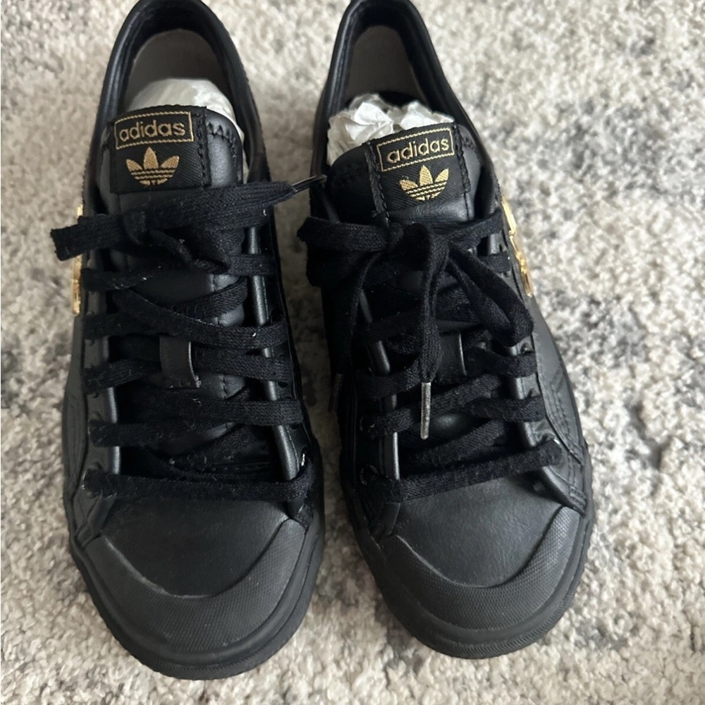 Adidas Black Shoes with Gold Details